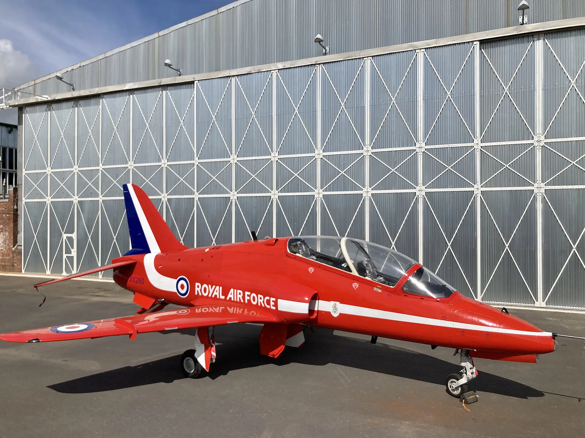 Red Arrows Hawk T1A XX260 outside hangar 2 at the Ulster Aviation Society