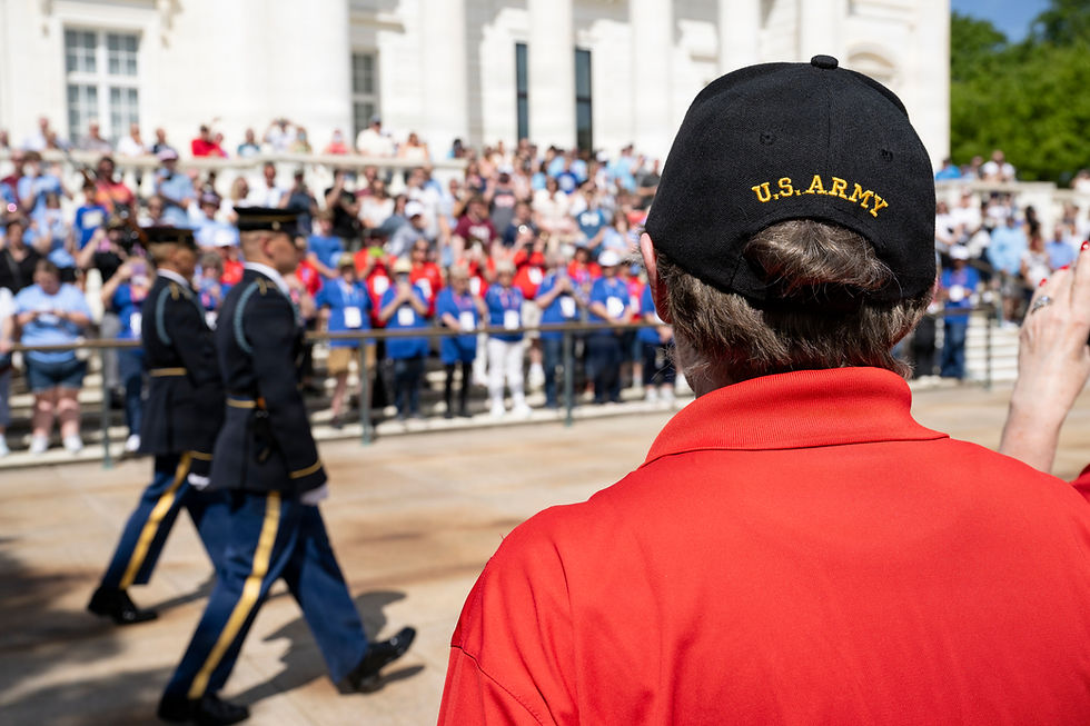 Army veteran wearing a U.S. Army cap while attending a public community event.