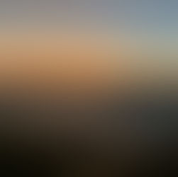 Sunset over the Pacific Ocean and rocky coastline in Mazatlán, Mexico.