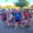West Valley Women Veterans members and volunteers holding American flags during a community service event in Arizona.