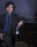 Oliver & piano pic_edited_edited.jpg