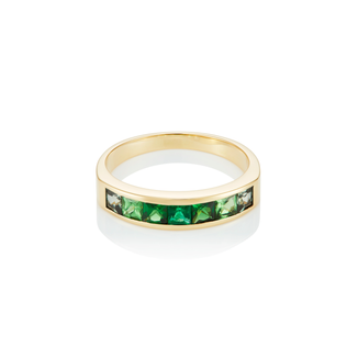Green gemstone and 18ct gold engagement ring.