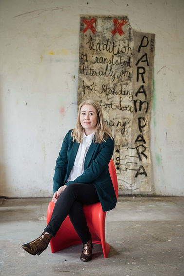 Portrait photography | Woman sat on red chair