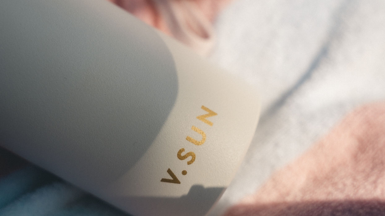 V.SUN Sonnencreme auf einem Handtuch bei Sponsoren Event 