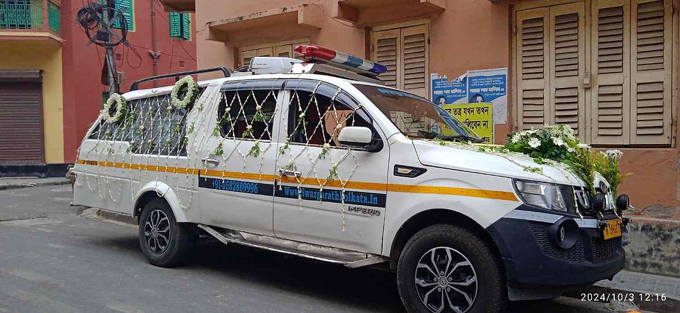 Decorated hearse vehicle for funeral transportation in Kolkata.
