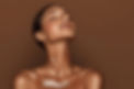 healthy-model-woman-with-clear-skin-brown-background-facial-treatment-cosmetology.jpg