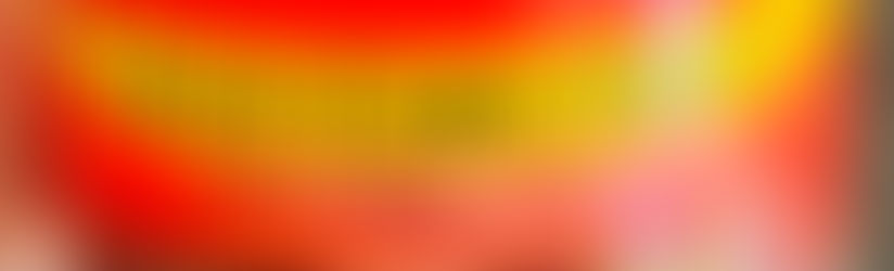 A label on a light corn syrup bottle featuring bold yellow and red text: "Light Corn Syrup with Real Vanilla."