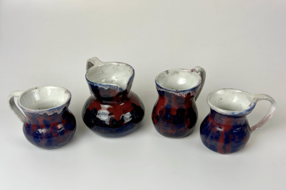 Small Pitcher and Mugs

Ceramic, Wheel thrown 2024