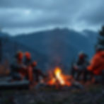hunters sitting around a campfire in Fall season in a mountain setting.jpg