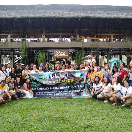 Bayambang Rural Health Unit II & III team building group photo at Reca Resort in Pampanga.