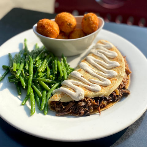 Doherty's Irish Pub & Restaraunt Mullingar
A traditional Irish potato pancake with your choice of filling. All 3 of our Boxtys are served with potato croquettes and haricots vert or order them as an appetizer sampler.

𝗧𝗛𝗘 𝗞𝗜𝗟𝗟𝗔𝗥𝗡𝗘𝗬 
Marinated chicken in a béchamel sauce, finished with creamy havarti cheese & fresh basil.
𝗧𝗛𝗘 𝗠𝗨𝗟𝗟𝗜𝗡𝗚𝗔𝗥 (𝑝𝑖𝑐𝑡𝑢𝑟𝑒𝑑)
Guinness braised brisket laced with fresh mushrooms, caramelized onions & topped with creamy horseradish sauce.
Ⓥ 𝗧𝗛𝗘 𝗗𝗢𝗡𝗘𝗚𝗔𝗟
Sliced mushrooms, caramelized red onion and roasted red peppers with a light red wine reduction & melted provolone cheese.