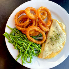 A traditional Irish potato pancake with your choice of filling. All 3 of our Boxtys are served with potato croquettes and haricots vert (can be substituted for other sides like our Beer Battered Onion Rings) or order them as an appetizer sampler.

𝗧𝗛𝗘 𝗞𝗜𝗟𝗟𝗔𝗥𝗡𝗘𝗬 (𝑝𝑖𝑐𝑡𝑢𝑟𝑒𝑑)
Marinated chicken in a béchamel sauce, finished with creamy havarti cheese & fresh basil.
𝗧𝗛𝗘 𝗠𝗨𝗟𝗟𝗜𝗡𝗚𝗔𝗥 
Guinness braised brisket laced with fresh mushrooms, caramelized onions & topped with creamy horseradish sauce.
Ⓥ 𝗧𝗛𝗘 𝗗𝗢𝗡𝗘𝗚𝗔𝗟
Sliced mushrooms, caramelized red onion and roasted red peppers with a light red wine reduction & melted provolone cheese.