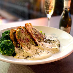 Doherty's Irish Pub & Restaurant Celtic Cordon Bleu
Herb-crusted chicken with a corned beef Rockefeller stuffing served over fresh mashed potatoes and steamed broccoli. Finished with a creamy béchamel sauce.
