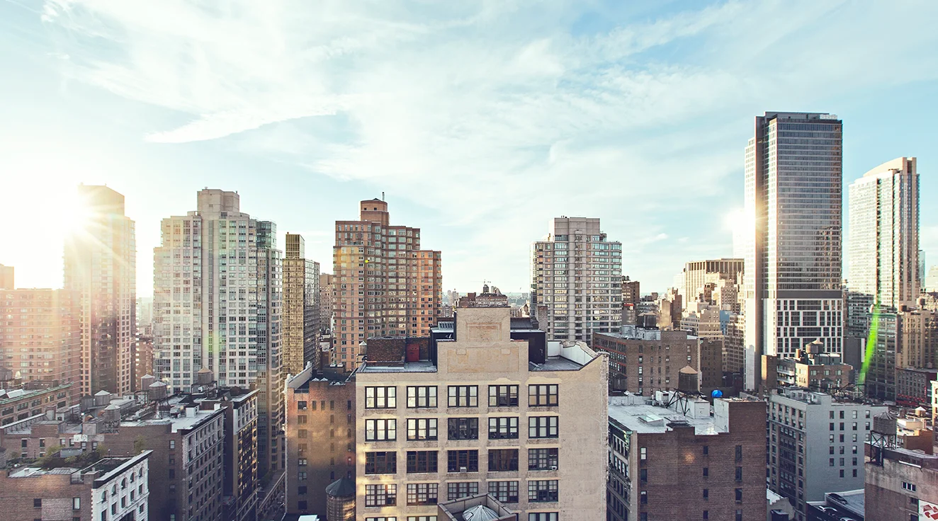 A rooftop view of Manhattan on the Buying page of Sidewalk Realty