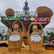 Two woven flasks of Lambanog are in front of a colorful festival sign reading "Quezon Tagayan sa Niyogyugan" with a festive background.