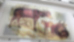 Vintage artwork of three Tamaraw displayed on a transparent sheet in a white building. The animals are brown with detailed textures.
