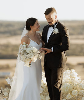 full service san antonio wedding planner and floral designer at a coordination for a rustic wedding in the texas hill country with lots of baby's breath and white roses