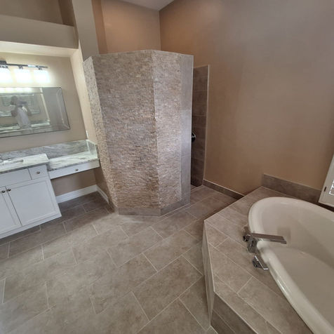 Custom stone shower area and new tile installation