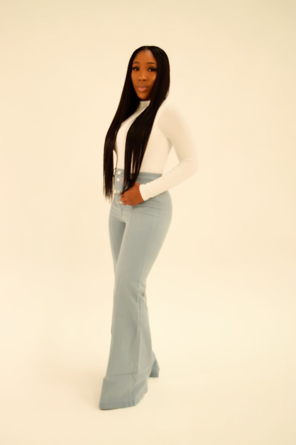 Thumbnail: Fit and Flare light wash denim jeans.