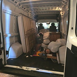 Picture of Soco Moves cargo van filled with customers Junk in La Mesa, CA.