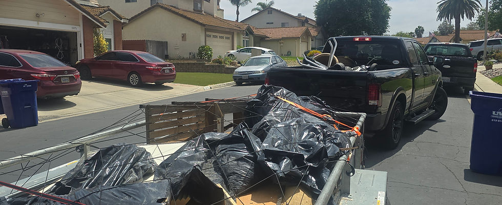 A trailer full of construction debris being taken away to the landfill in El Cajon