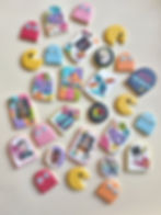 Custom decorated sugar cookies with cartoon characters for a themed kids’ birthday party