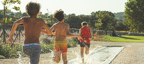 Giardini Pistola Laszlo and Raffi kids running in the water rill 2022_edited_edited.jpg
