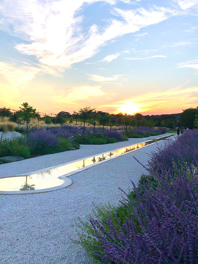 Giardini Pistola rill at sunset people in distance.jpeg