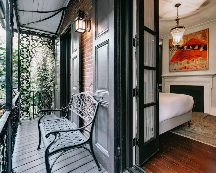 Balcony seating area adjacent to guest room at The DWIGHT D Hotel