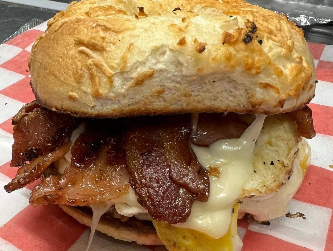 breakfast sandwich close-up – bacon, egg & cheese
