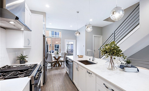 White Traditional Staged Kitchen with Green Accents