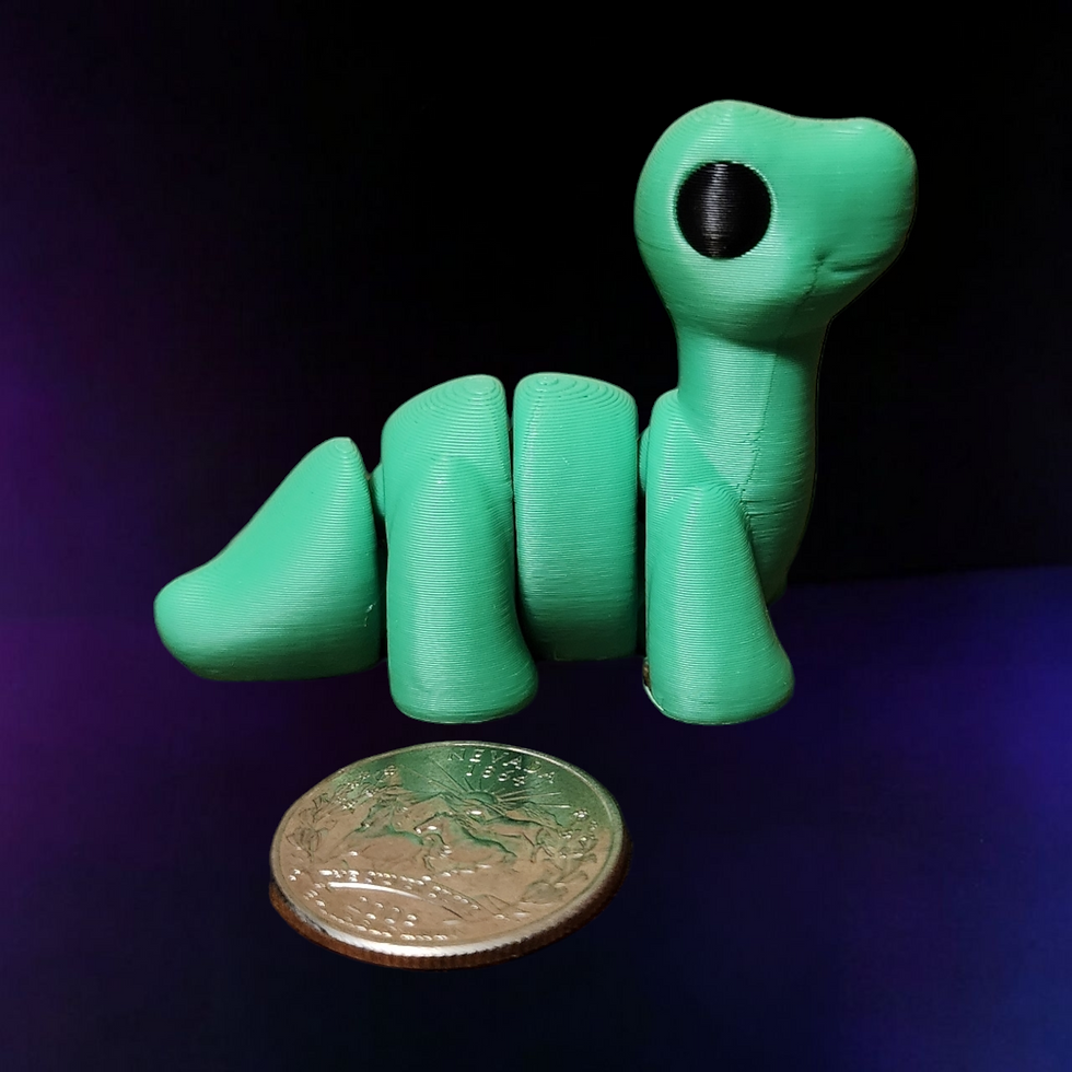 brontosaurus next to quarter for size comparison