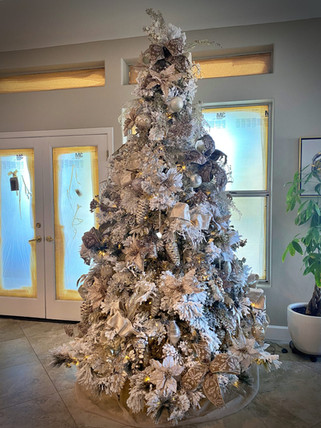 snowy-artificial-Christmas-tree-with-cones.JPEG