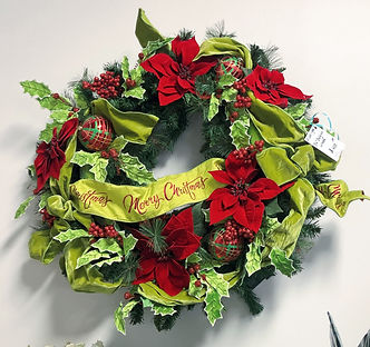 Merry Christmas wreath with red poinsettias