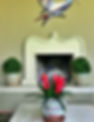 patio-fireplace-with-boxwood-and-bromeli