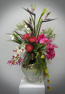 orchids strelitzia and protea arrangement
