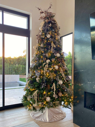 Christmas-tree-near-black-marble-fireplace.JPEG