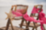 Chairs with sashes and starfish