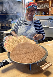 Laila with injera IMG_0814.jpg