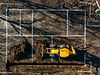top-view-excavator-digging-foundation-construction-site.jpg