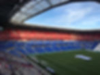 A wide angle shot of the Groupama Olympique Lyonnais Stadium in Lyon