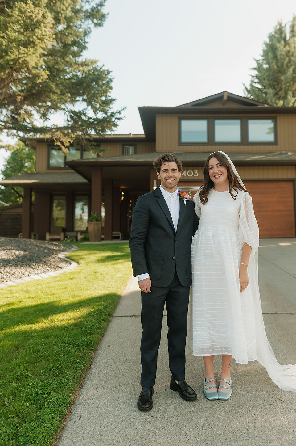 bride and groom portrait boho white wedding dress