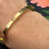 Thumbnail: gold one in a million bangle