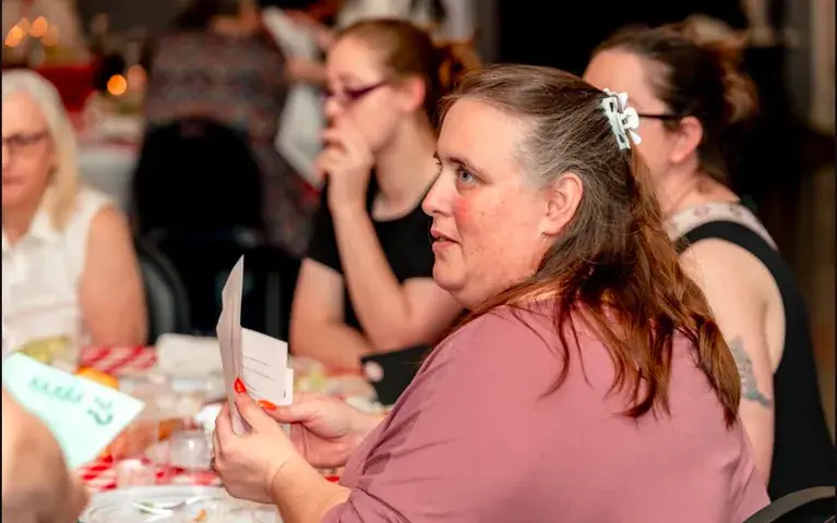 audience member investigating