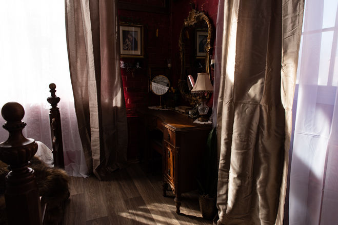 ornate gold mirror and antique boudoir vanity