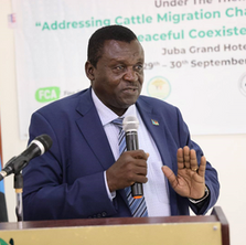 Governor speaking at the conference