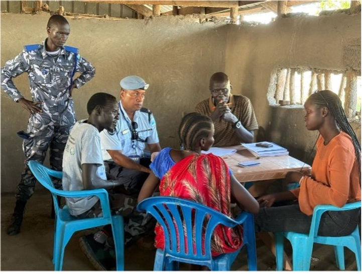 A mobile court official documents case in preparation to the hearing. Image: World Relief