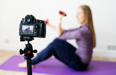 female-vlogger-recording-sports-related-