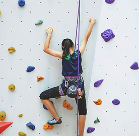 Woman Rock Climbing