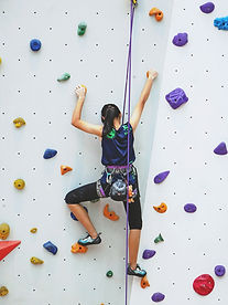 Woman Rock Climbing